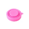 Portable pink silicone collapsible travel cup shown in its compact folded state - 170ml / Pink