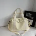 Spacious cream-colored duffle bag for sports, travel, and fitness training use - W42 x H27 x D18cm / Off White