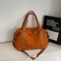 Large capacity waterproof sports gym bag in burnt orange with adjustable shoulder strap - W42 x H27 x D18cm / Brown