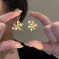 Dainty gold flower drop earrings with long wire hooks for a vintage aesthetic look - Long Floral Style (E4490) / Gold
