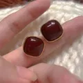 Elegant minimalist square stud earrings in deep red with a vintage gold border finish - Simple Gold Rim Square Style (E3604 Red Gold)