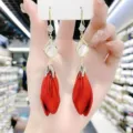 Elegant long drop earrings featuring red fabric petals, zircon accents and cat's eye beads - Spiral Tassel Style (E1568) / Gold/White/Red