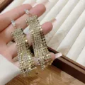 Elegant gold-toned long tassel earrings with sparkling rhinestones for evening party wear - Marquise Rhinestone Spliced Long Tassel Style (E3224 Gold) / Gold