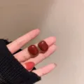 Elegant vintage red resin stud earrings with gold beaded rim for women - Red Rounded Rectangle Vintage Studs (E3135)