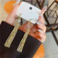 Elegant gold-tone tassel earrings with multi-row sparkling rhinestones for women - Four-row Rhinestone Tassel Style (E3066) / Gold