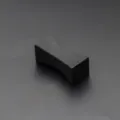 Modern matte black alloy chopstick rest with elegant bowtie shape for minimalist table settings - Black Chopstick Rest
