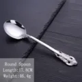 Vintage stainless steel round spoon with embossed floral handle pattern - Round Spoon / Silver