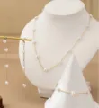 Elegante set di gioielli con collana bracciale e orecchini con perle a cuore oro - Set Perle Cuore / Cuore Oro