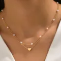 Collana doppia catena dorata con delicate perle bianche e ciondolo a cuore donna. - Stile Cuore a Doppio Strato (03) / Oro