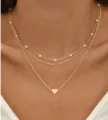 Elegante set di collane dorate a tre strati con perle delicate e ciondolo a cuore dolce - Stile Cuore a Tre Strati (01) / Oro