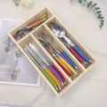 Detailed top view of 24-piece colorful cutlery set neatly arranged in a wooden storage box - Colorful pointed knife set of 24 pieces with box