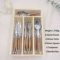 Detailed view of 24pcs stainless steel cutlery set with wood handles in a wooden box - 24 Pieces With Wooden Box