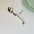Laguiole style stainless steel spoon with cream white curved handle, 15cm total length - Single Tea Spoon