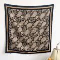 Detailed view of large square scarf with ethnic paisley print and golden borders - RY-47