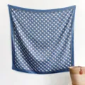 Detailed view of a navy blue and white geometric checkered square silk scarf for women - 90x90cm / Blue
