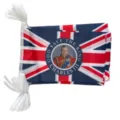 Decorative UK Union Jack bunting flags featuring King Charles III portrait for national events - King Charles III Coronation Bunting