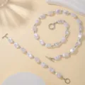 Dettaglio del set collana e bracciale in perle barocche con chiusura OT in argento - Bracciale (YR-5066) / Argento