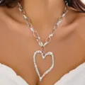 Detailed macro view showing the textured lava heart pendant on a silver chunky chain - Single Layer Lava Heart Heavy Chain Necklace / Silver