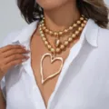 Chic gold baroque double layer bead necklace featuring oversized lava heart pendant - Double Layer Bead Lava Heart Necklace / Gold