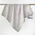 Detailed view of the soft texture and tiny floral print on this cotton square scarf. - RY-52