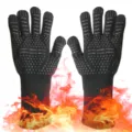 Black heat resistant BBQ gloves with silicone grip, professional oven and grilling protection. - Black Equals (===) One Size