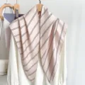 Close-up of elegant retro striped triangular silk scarf in nude pink with black lines - 87*130CM / Pink Stripe