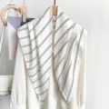 Detailed macro view of a white vintage striped silk scarf shawl accessory on a blouse - 87*130CM / White Striped