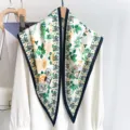 Detailed view of the elegant floral and carriage print on a white triangular scarf - Triangle Scarf (TBSJJ116) / 87*130CM / Black