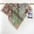 Vintage ethnic style cotton square scarf featuring floral and geometric patterns draped on a rod. - RY-11