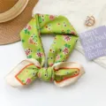 Green cotton floral pattern neckerchief tied in a bow with stylish border detail - 65x65cm / Green