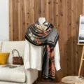 Elegant floral printed cotton linen scarf on mannequin in cozy living room setting - Black Orange / 180x85cm