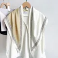 Close-up of a stylish color-blocking silk triangle scarf styled on a white blouse - 87*130CM / Beige