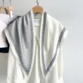 Detailed view of a grey and white color-block triangle scarf on a white blouse. - 87*130CM / Grey/White