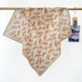 Close-up of French vintage cotton floral square scarf with delicate orange flower prints. - RY-26