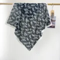 French vintage cotton square scarf with white floral print on navy background hanging - RY-23