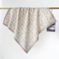Elegant vintage pattern square cotton scarf hanging on a metal rod for product display - RY-50