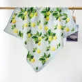 Detailed view of a 100% cotton square scarf with fresh lemon prints and blue stripes - RY-35