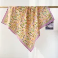 Detailed macro view of a vibrant dopamine-style geometric pattern cotton square scarf for women - RY-38