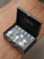 Detailed view of handmade white porcelain tea set presented in a premium grey gift box suitcase - Landscape Pattern Set With Tea Caddy