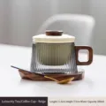 Minimalistisches Teetassen-Set aus Glas mit Holzgriff und Untersetzer in Cremegelb, 200 ml. - 200ml (Mit Filter/Untersetzer/Löffel) / Beige