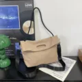 Casual khaki nylon messenger bag with adjustable wide strap and unique cutout handle - S / Khaki