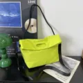 Neon green nylon messenger bag with black adjustable shoulder strap for daily commuting. - S / Fluorescent Green