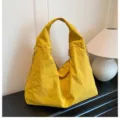 Large yellow nylon hobo bag with wide shoulder strap and waterproof fabric. - One Size / Yellow