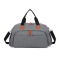 Grand sac de voyage gris fourre-tout sport avec poignées noires et curseurs en cuir. - Gris