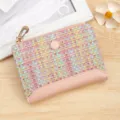Colorful woven women's wallet with pink leather trim and secure zipper closure. - Pink