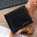 Elegant black men's wallet featuring a brushed texture finish and MenBense logo on wood. - Black (Z6-1)
