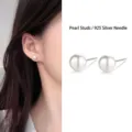 Close-up of elegant white pearl stud earrings with S925 silver needles for sensitive ears - Simple Pearl Stud Earrings (E0240)