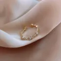 Close-up of elegant gold open ring with pearls and zircons on silk background - Artificial Pearl Rhinestone Row Style (J0012) / Adjustable Open