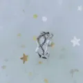 Close-up of vintage silver hollow wavy open ring on starry mesh fabric - Adjustable Open / Hollow Wave Star Style (J0026) / Silver