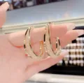Elegant gold-plated double layer hoop earrings with sparkling mesh inlay texture design - Double Hoop Gold Style (E1748 Gold)